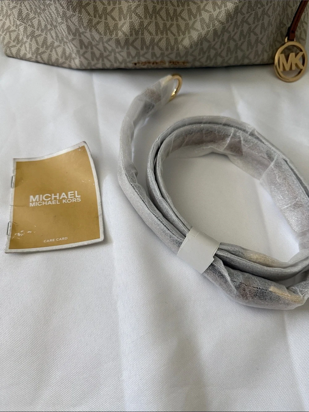 Michael Kors Cream Signature Canvas Hobo with Tan Leather Trim